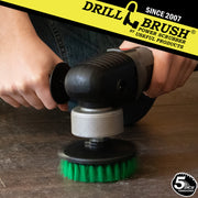 Drillbrush Medium Green 5 inch Threaded brush in a polisher cleaning a wood kitchen floor.