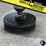 Drillbrush Ultra Stiff Black 5 inch brush cleaning salt stains off of a concrete floor.