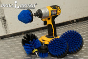 Medium Blue Drillbrush 542CO kit with a cordless drill on diamond plating in a garage.