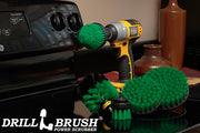 Medium Green Drillbrush 542CO kit with a cordless drill on a stovetop in a kitchen.