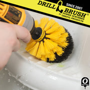 Drillbrush Original Medium Yellow Bathroom Brush cleaning a shower shelf.