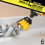 Drillbrush 2 inch Long Medium Yellow Bathroom Brush cleaning a tub overflow plate.