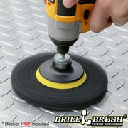 The Drillbrush Aggressive Black 6 inch Scrubbing Pad attached to a 3 inch backer (not included) cleaning diamond-plated flooring.