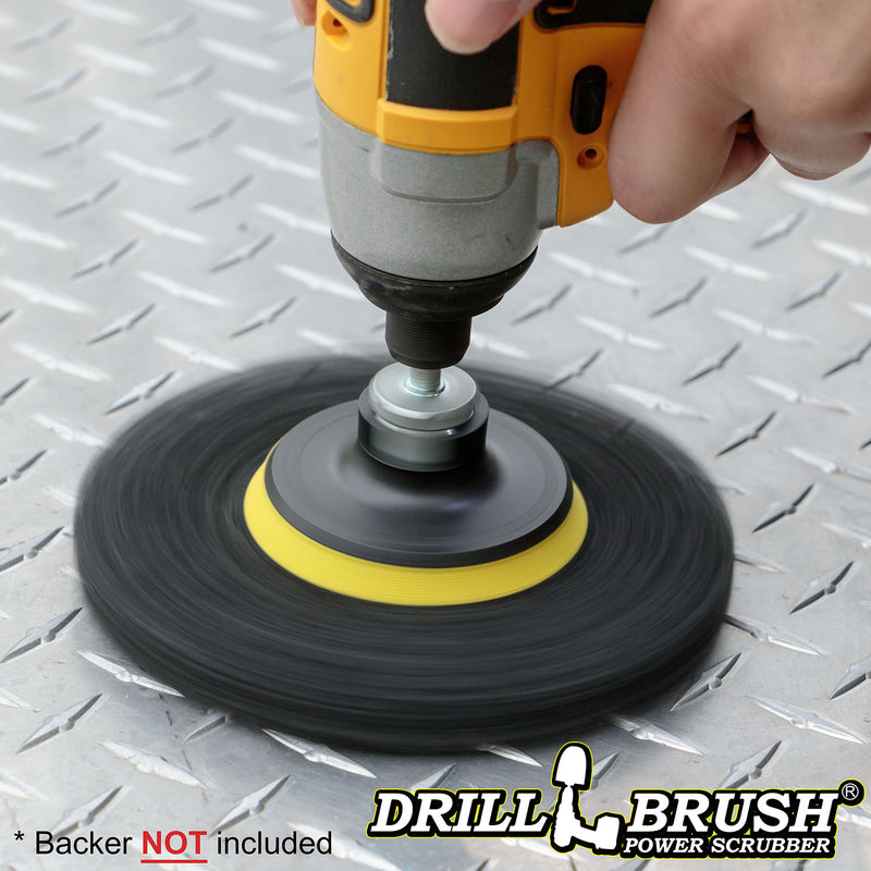 The Drillbrush Aggressive Black 6 inch Scrubbing Pad attached to a 3 inch backer (not included) cleaning diamond-plated flooring.