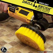 Drillbrush Ultra Stiff Black 7 inch brush in a variable speed polisher cleaning bathroom tile.