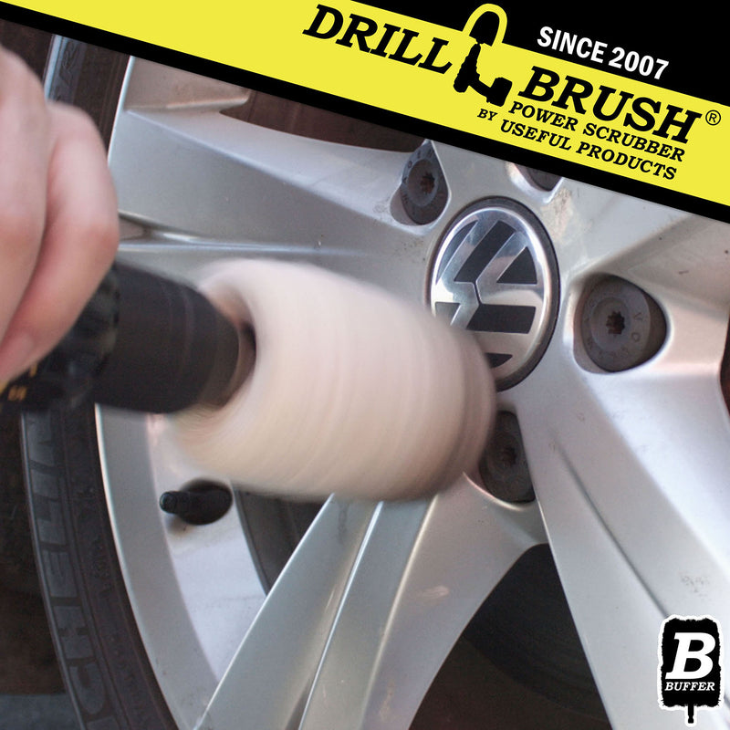 A Drillbrush Cotton Buffer cleaning rims on a car.