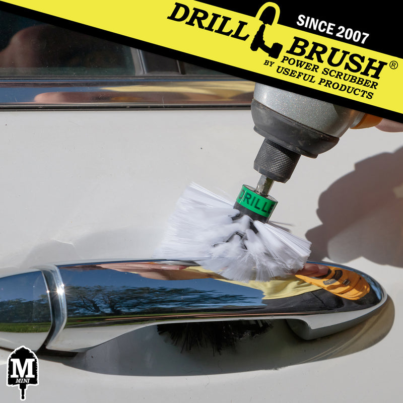 Drillbrush Mini Soft White Home & Auto Brush cleaning a car door handle.