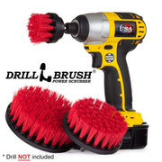 The Drillbrush 542 Stiff Red Outdoor Brush Kit with 2 inch brush placed in a cordless drill.
