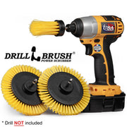 2 Drillbrush Medium Yellow Bathroom Edge brushes and a Medium Yellow 1 inch Long brush in front of a cordless drill.
