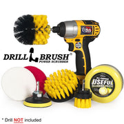 Drillbrush Medium Yellow 4 inch, 2 inch Short, and Original brushes with a Soft White and Stiff Red 4 inch scrub pad, a 3 inch pad backer, and All-Purpose Useful Cleaning Paste in front of a drill that is holding the Original brush.
