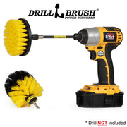 Drillbrush 4O-5X Medium Yellow Bathroom Brush Kit with a 4 inch brush in a 5 inch extension in a cordless drill.