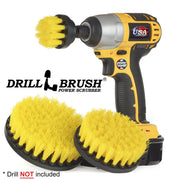 The Drillbrush 542 Medium Yellow Bathroom Brush Kit with 2 inch brush placed in a cordless drill.
