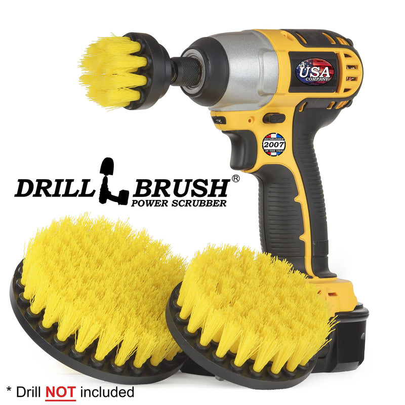 The Drillbrush 542 Medium Yellow Bathroom Brush Kit with 2 inch brush placed in a cordless drill.