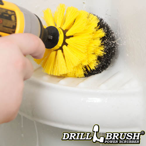 Drillbrush Original Medium Yellow Bathroom Brush cleaning a shower shelf.