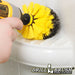 Drillbrush Original Medium Yellow Bathroom Brush cleaning a shower shelf.