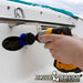 Drillbrush 2 inch Short Medium Blue Marine & Pool Brush cleaning the stern of a boat.