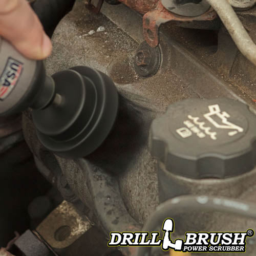 Drillbrush 2 inch Long Ultra Stiff Black Grill & Industrial Brush cleaning an engine block.