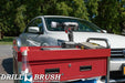 Drillbrush 2 inch Short Soft White Home & Auto Brush in a cordless drill on a tool cart in front of a white sedan.