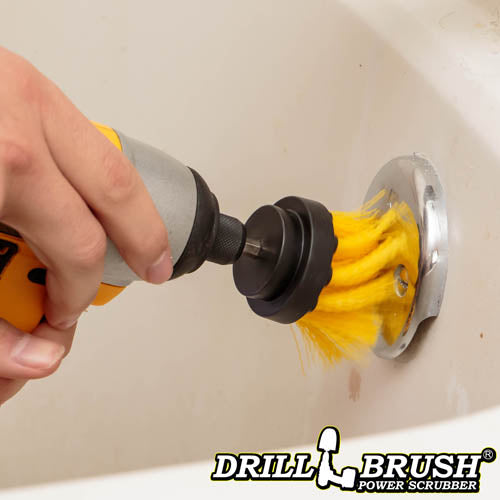 Drillbrush 2 inch Long Medium Yellow Bathroom Brush cleaning a tub overflow plate.