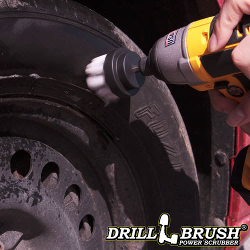 Drillbrush 2 inch Short Soft White Home & Auto Brush cleaning a tire.