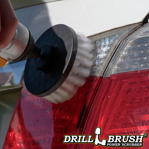 Drillbrush 4 inch Soft White Home & Auto Brush cleaning a car's tail light.