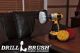 The Drillbrush Soft White, Medium Yellow, and Stiff Red 4 inch 3-piece Variety Brush Kit sitting on a desk in front of a leather sofa.