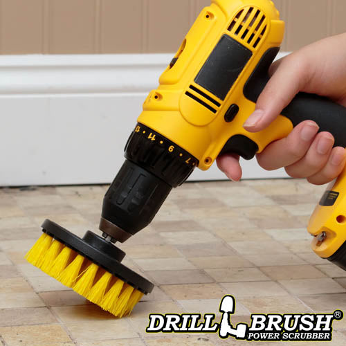 Drillbrush 4 inch Medium Yellow Bathroom Brush cleaning tile grout on a bathroom floor.