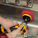 The Drillbrush Moderate Red 4 inch Scrubbing Pad attached to a 3 inch backer (not included) cleaning the wall of a kitchen sink.