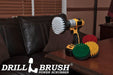 The Drillbrush 4-piece 4 inch Flat Brush kit on a desk in an office in front of a sofa.
