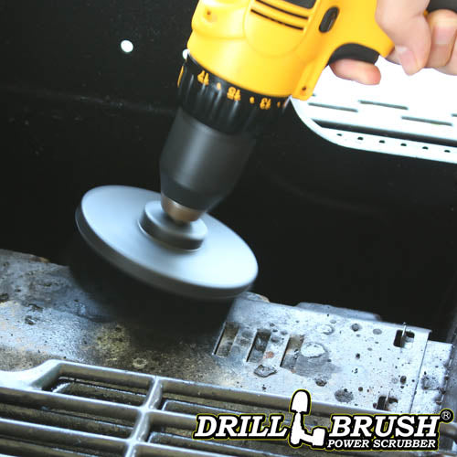 Drillbrush 4 inch Ultra Stiff Black Grill & Industrial Brush cleaning a grill burner shield.