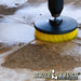 Drillbrush 5 inch Hex Medium Yellow Bathroom Brush cleaning a dirt-covered tile floor.