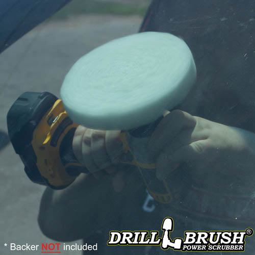The Drillbrush Soft White 5 inch Scrubbing Pad attached to a 3 inch backer (not included) cleaning the inside of a car's windshield.