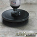 Drillbrush 5 inch Ultra Stiff Black Grill & Industrial Brush cleaning a concrete floor.