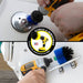 Action shots of a Medium Blue 2 inch Long Drillbrush cleaning a gas cap and a Medium Blue Mini brush cleaning a handle.