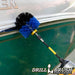 Drillbrush Original Medium Blue Marine & Pool Brush in a 5 inch extension cleaning the trim of a boat.