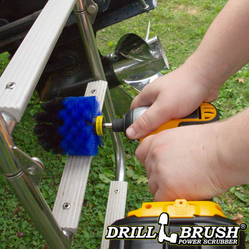 Drillbrush Original Medium Blue Marine & Pool Brush cleaning the a boat ladder.