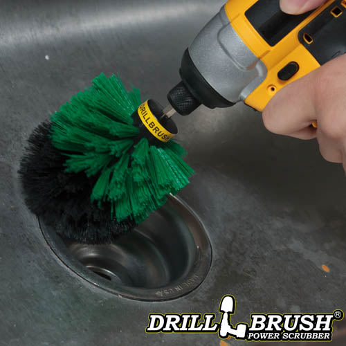 Drillbrush Original Medium Green Kitchen Brush cleaning a sink drain.