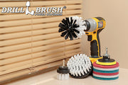 The Soft White Drillbrush 42O Home & Auto Kit with six 4 inch Variety Pads with an Original in a cordless drill in front of a closed window.